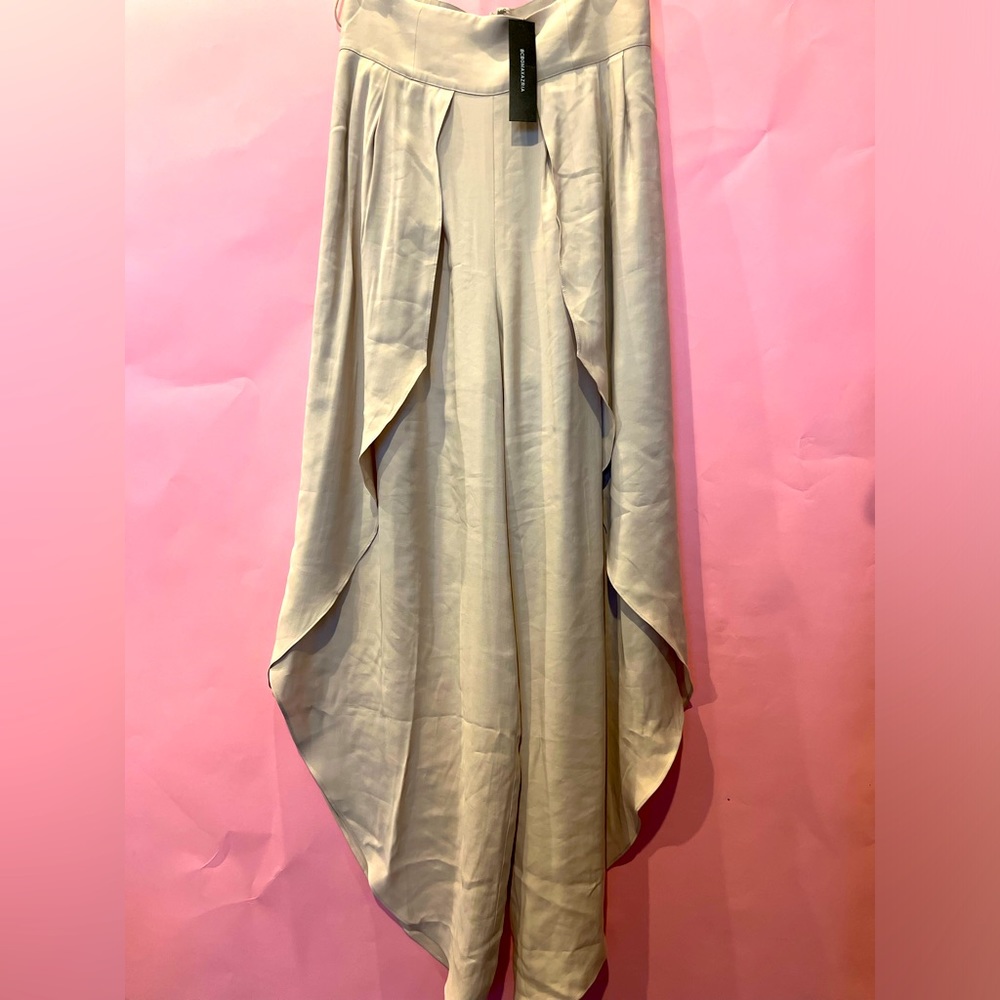 Elegant Beige size small BCBGMaxAzria pants new. 14”waist 45”long 30”inseam